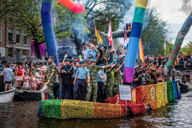 August 1, 2026, Amsterdam, North Holland, Netherlands: Members of the Dutch military join Amsterdam Pride s Canal Parade. August 1, 2026, Amsterdam, the Netherlands. Hundreds of thousands of spectators joined the 30th edition of the Pride Canal Parade, the highlight of WorldPride Amsterdam 2026. This yearÃ¢â‚¬â ¢s parade also included the WorldPride Stadium grandstand, with seating for approximately 10,000 people to watch as floats pass. Amsterdam Netherlands - ZUMAp202 20260801_zip_p202_058 Copyright: xJamesxPetermeierx