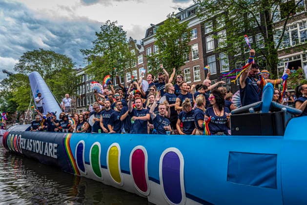 August 1, 2026, Amsterdam, North Holland, Netherlands: Delta and KLM Airlines workers join Amsterdam Pride s Canal Parade on August 1, 2026, in Amsterdam, the Netherlands. Hundreds of thousands of spectators joined the 30th edition of the Pride Canal Parade, the highlight of WorldPride Amsterdam 2026. This yearÃ¢â‚¬â ¢s parade also included the WorldPride Stadium grandstand, with seating for approximately 10,000 people to watch as floats pass by. Amsterdam Netherlands - ZUMAp202 20260801_zip_p202_084 Copyright: xJamesxPetermeierx