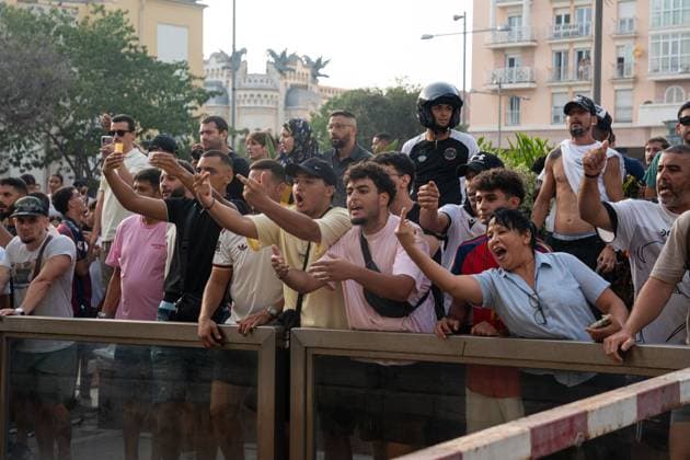 August 1, 2026, Ceuta, Spain: Demonstrators gather in Ceuta to protest against far-right groups following calls for an anti-immigration rally after the arrival of tens of thousands of migrants. Authorities blocked the entry of members of the group Nucleo Nacional, while activist Alvise Perez entered the city and later left under police escort. Ceuta Spain - ZUMAq101 20260801_zna_q101_213 Copyright: xMarioxMorenox