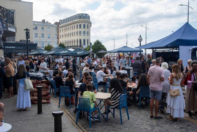 August 1, 2026, Margate, United Kingdom: Revellers and tourists relax at the merchandise area with the food and drink during the Margate Soul Festival. The Margate Soul Weekender (also known as Margate Soul Festival) celebrated its 25th anniversary from Friday, July 31 to Sunday, August 2, 2026. It is widely recognized as the UK s largest independent soul street party and festival. Spanning three days, it transforms the seaside town into a massive celebration of soul, funk, jazz-funk, reggae, and R&B. Margate United Kingdom - ZUMAs197 20260801_aaa_s197_109 Copyright: xKrisztianxElekx