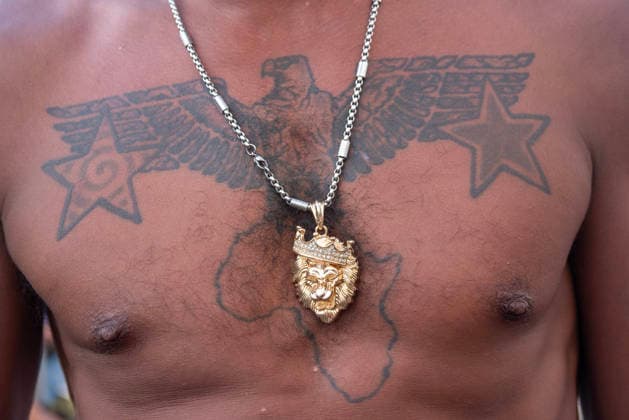 August 1, 2026, Margate, United Kingdom: A reveller shows his tattoo to the camera during the Margate Soul Festival. The Margate Soul Weekender (also known as Margate Soul Festival) celebrated its 25th anniversary from Friday, July 31 to Sunday, August 2, 2026. It is widely recognized as the UK s largest independent soul street party and festival. Spanning three days, it transforms the seaside town into a massive celebration of soul, funk, jazz-funk, reggae, and R&B. Margate United Kingdom - ZUMAs197 20260801_aaa_s197_120 Copyright: xKrisztianxElekx