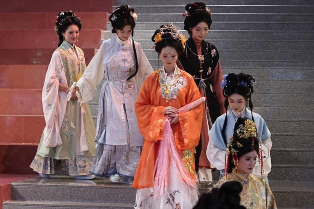 NANJING, CHINA - AUGUST 01: Contestants in traditional costumes walk on the stage during an ancient costume competition on August 1, 2026 in Nanjing, Jiangsu Province of China. The event showcased the beauty of traditional Chinese clothing.  Copyright: xChinaxNewsxServicex 111657690665