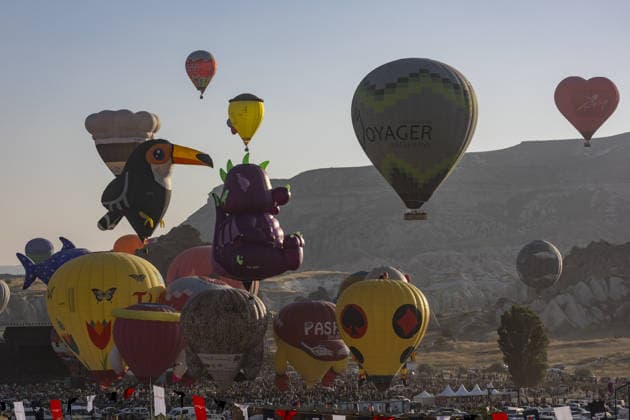 Cappadocia Balloon Festival concludes with colorful scenes NEVSEHIR, TURKIYE - AUGUST 2: A view of balloons during the 7th Cappadocia Balloon Festival concluded with the participation of 30 special-shaped hot air balloons brought from Turkiye and abroad in Nevsehir, Turkiye, on August 2, 2026. As part of the festival, sunrise demonstration flights over Goreme featured heart, owl, parrot, rocket, and globe-shaped balloons, creating colorful scenes above the region s iconic fairy chimneys and attracting the attention of both local and international visitors. Osmancan Gurdogan Anadolu Nevsehir Turkey. Editorial use only. Please get in touch for any other usage.  Copyright: x2026xAnadoluxOsmancanxGurdoganx