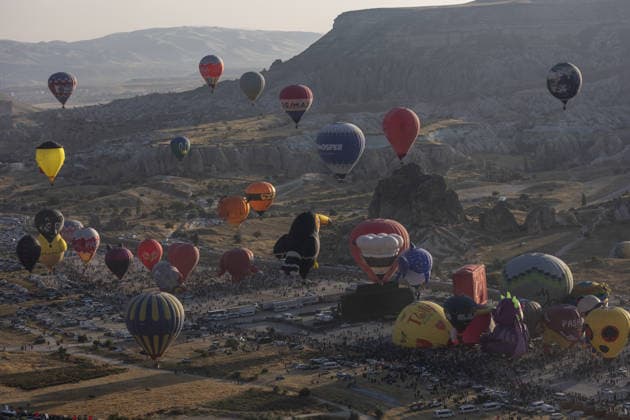 Cappadocia Balloon Festival concludes with colorful scenes NEVSEHIR, TURKIYE - AUGUST 2: A view of balloons during the 7th Cappadocia Balloon Festival concluded with the participation of 30 special-shaped hot air balloons brought from Turkiye and abroad in Nevsehir, Turkiye, on August 2, 2026. As part of the festival, sunrise demonstration flights over Goreme featured heart, owl, parrot, rocket, and globe-shaped balloons, creating colorful scenes above the region s iconic fairy chimneys and attracting the attention of both local and international visitors. Osmancan Gurdogan Anadolu Nevsehir Turkey. Editorial use only. Please get in touch for any other usage.  Copyright: x2026xAnadoluxOsmancanxGurdoganx