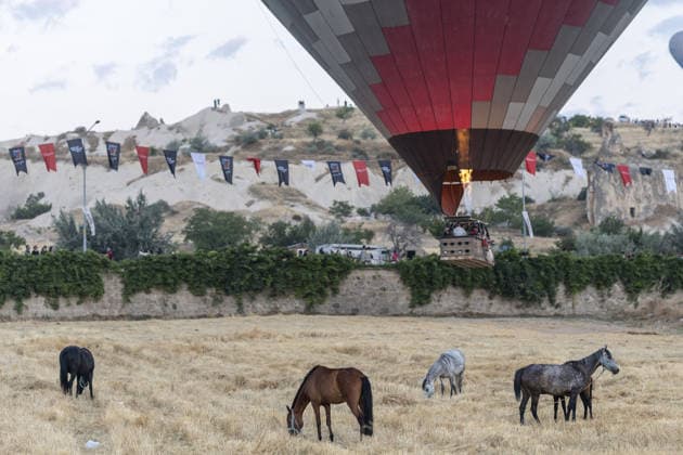 Cappadocia Balloon Festival concludes with colorful scenes NEVSEHIR, TURKIYE - AUGUST 2: A view of a balloon with horses during the 7th Cappadocia Balloon Festival concluded with the participation of 30 special-shaped hot air balloons brought from Turkiye and abroad in Nevsehir, Turkiye, on August 2, 2026. As part of the festival, sunrise demonstration flights over Goreme featured heart, owl, parrot, rocket, and globe-shaped balloons, creating colorful scenes above the region s iconic fairy chimneys and attracting the attention of both local and international visitors. Osmancan Gurdogan Anadolu Nevsehir Turkey. Editorial use only. Please get in touch for any other usage.  Copyright: x2026xAnadoluxOsmancanxGurdoganx