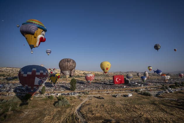 Cappadocia Balloon Festival concludes with colorful scenes NEVSEHIR, TURKIYE - AUGUST 2: A view of balloons during the 7th Cappadocia Balloon Festival concluded with the participation of 30 special-shaped hot air balloons brought from Turkiye and abroad in Nevsehir, Turkiye, on August 2, 2026. As part of the festival, sunrise demonstration flights over Goreme featured heart, owl, parrot, rocket, and globe-shaped balloons, creating colorful scenes above the region s iconic fairy chimneys and attracting the attention of both local and international visitors. Osmancan Gurdogan Anadolu Nevsehir Turkey. Editorial use only. Please get in touch for any other usage.  Copyright: x2026xAnadoluxOsmancanxGurdoganx