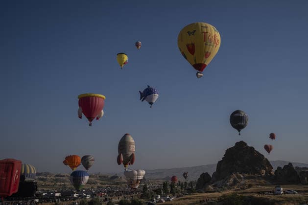 Cappadocia Balloon Festival concludes with colorful scenes NEVSEHIR, TURKIYE - AUGUST 2: A view of balloons during the 7th Cappadocia Balloon Festival concluded with the participation of 30 special-shaped hot air balloons brought from Turkiye and abroad in Nevsehir, Turkiye, on August 2, 2026. As part of the festival, sunrise demonstration flights over Goreme featured heart, owl, parrot, rocket, and globe-shaped balloons, creating colorful scenes above the region s iconic fairy chimneys and attracting the attention of both local and international visitors. Osmancan Gurdogan Anadolu Nevsehir Turkey. Editorial use only. Please get in touch for any other usage.  Copyright: x2026xAnadoluxOsmancanxGurdoganx