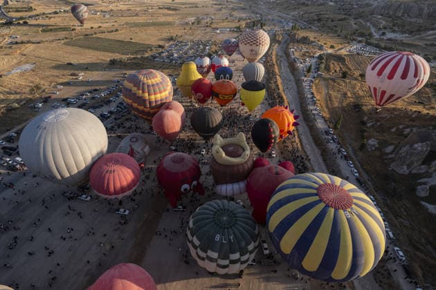 Cappadocia Balloon Festival concludes with colorful scenes NEVSEHIR, TURKIYE - AUGUST 2: A view of balloons during the 7th Cappadocia Balloon Festival concluded with the participation of 30 special-shaped hot air balloons brought from Turkiye and abroad in Nevsehir, Turkiye, on August 2, 2026. As part of the festival, sunrise demonstration flights over Goreme featured heart, owl, parrot, rocket, and globe-shaped balloons, creating colorful scenes above the region s iconic fairy chimneys and attracting the attention of both local and international visitors. Osmancan Gurdogan Anadolu Nevsehir Turkey. Editorial use only. Please get in touch for any other usage.  Copyright: x2026xAnadoluxOsmancanxGurdoganx
