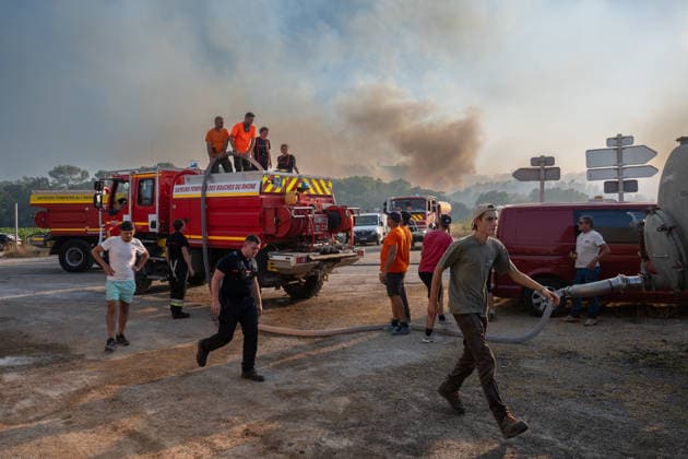 Wildfires in the Var - Near Correns At a place known as Les Quatre Chemins, volunteers are organizing supplies for the firefighters battling the Gros Bessillon wildfire near Correns, Var, southeastern France on August 1, 2026. Photo by Laurent Coust ABACAPRESS.COM Correns France  Copyright: xCoustxLaurent ABACAx