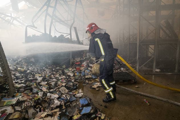 Russian drone strike hits book warehouse in Kharkiv KHARKIV, UKRAINE - AUGUST 1: Firefighters respond to area after two Russian attack drones struck a book warehouse destroying part of the building and sparking a fire that spread across 8,900 square meters in Kharkiv, Ukraine, on August 1, 2026. No casualties were reported, though one firefighter suffered heatstroke while battling the blaze. The warehouse belongs to Ukrainian publisher Ranok and also serves as the distribution center for the KnygoLand bookstore chain. Serhii Masin Anadolu Kharkiv Ukraine. Editorial use only. Please get in touch for any other usage.  Copyright: x2026xAnadoluxSerhiixMasinx