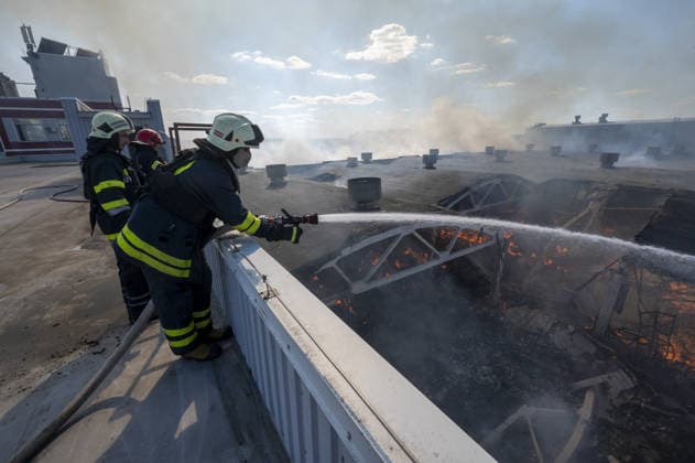 Russian drone strike hits book warehouse in Kharkiv KHARKIV, UKRAINE - AUGUST 1: Firefighters respond to area after two Russian attack drones struck a book warehouse destroying part of the building and sparking a fire that spread across 8,900 square meters in Kharkiv, Ukraine, on August 1, 2026. No casualties were reported, though one firefighter suffered heatstroke while battling the blaze. The warehouse belongs to Ukrainian publisher Ranok and also serves as the distribution center for the KnygoLand bookstore chain. Serhii Masin Anadolu Kharkiv Ukraine. Editorial use only. Please get in touch for any other usage.  Copyright: x2026xAnadoluxSerhiixMasinx