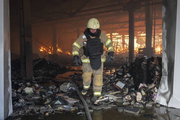 Russian drone strike hits book warehouse in Kharkiv KHARKIV, UKRAINE - AUGUST 1: Firefighters respond to area after two Russian attack drones struck a book warehouse destroying part of the building and sparking a fire that spread across 8,900 square meters in Kharkiv, Ukraine, on August 1, 2026. No casualties were reported, though one firefighter suffered heatstroke while battling the blaze. The warehouse belongs to Ukrainian publisher Ranok and also serves as the distribution center for the KnygoLand bookstore chain. Serhii Masin Anadolu Kharkiv Ukraine. Editorial use only. Please get in touch for any other usage.  Copyright: x2026xAnadoluxSerhiixMasinx