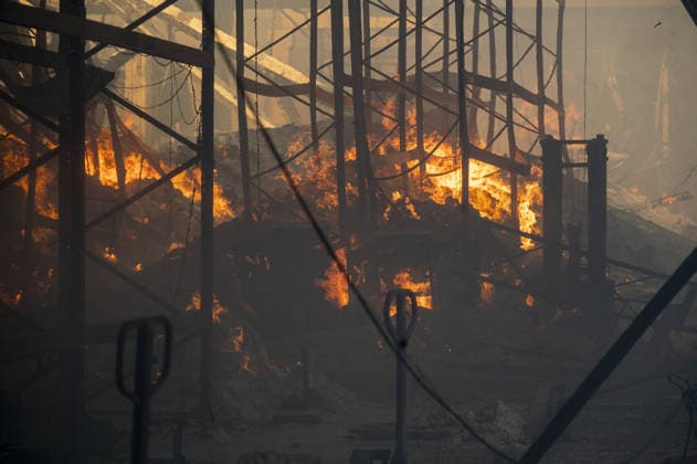 Russian drone strike hits book warehouse in Kharkiv KHARKIV, UKRAINE - AUGUST 1: A view of the fire as firefighters respond to area after two Russian attack drones struck a book warehouse destroying part of the building and sparking a fire that spread across 8,900 square meters in Kharkiv, Ukraine, on August 1, 2026. No casualties were reported, though one firefighter suffered heatstroke while battling the blaze. The warehouse belongs to Ukrainian publisher Ranok and also serves as the distribution center for the KnygoLand bookstore chain. Serhii Masin Anadolu Kharkiv Ukraine. Editorial use only. Please get in touch for any other usage.  Copyright: x2026xAnadoluxSerhiixMasinx