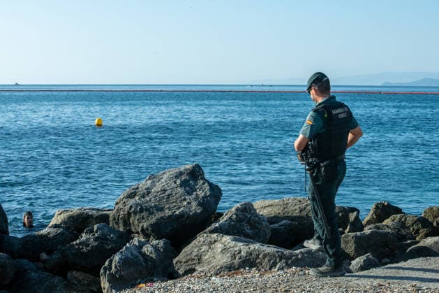 August 2, 2026, Ceuta, Madrid, Spain: A migrant attempts to swim across the border under the watchful eye of the Spanish Civil Guard at El Tarajal beach in Ceuta, Spain, August 2, 2026. Ceuta Spain - ZUMAd308 20260802_zsp_d308_015 Copyright: xJuanxCarlosxLucasx
