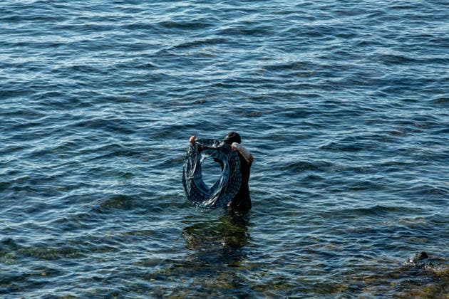 August 2, 2026, Ceuta, Madrid, Spain: A migrant attempts to swim across the border under the watchful eye of the Spanish Civil Guard at El Tarajal beach in Ceuta, Spain, August 2, 2026. Ceuta Spain  - ZUMAd308 20260802_zsp_d308_034 Copyright: xJuanxCarlosxLucasx