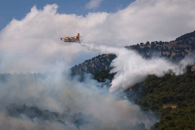 Firefighters battle wildfire in Viotia with air and ground operations VIOTIA, GREECE - AUGUST 2: A firefighting helicopter battles a wildfire burning near Porto Germeno, 70 kilometres northwest of Athens in the region of Viotia, Greece, on August 2, 2026 Costas Baltas Anadolu Viotia Greece. Editorial use only. Please get in touch for any other usage.  Copyright: x2026xAnadoluxCostasxBaltasx