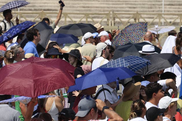 Pope Leo XIV expresses concern over migrant crisis in Ceuta VATICAN CITY, VATICAN, AUGUST 02: Faithful take shelter from the hot sun as they wait for the Angelus noon prayer celebrated by Pope Leo XIV from his studio window overlooking St. Peter s Square at the Vatican, August 02, 2026. Speaking in Spanish, the Pope expressed concern over the alarming situation in Ceuta, the Spanish autonomous city on the northern coast of Africa, where in recent days tens of thousands of people have attempted to cross by sea from Morocco and at least 67 have died. Riccardo De Luca Anadolu Vatican City Vatican. Editorial use only. Please get in touch for any other usage.  Copyright: x2026xAnadoluxRiccardoxDexLucax