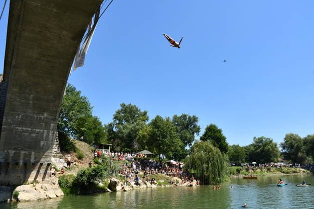 76th Shvan Bridge Diving Competition takes place in Gjakova GJAKOVA, KOSOVO - AUGUST 2: The 76th Traditional Shvan Bridge Diving Competition held in the city of Gjakova in southwestern Kosovo, on August 2, 2026. Divers competed by jumping from the historic Shvan Bridge into the river below as part of the annual event, which attracts participants and spectators and continues to preserve the region s long-standing cultural tradition. Eren Beksac Anadolu Gjakova Kosovo. Editorial use only. Please get in touch for any other usage.  Copyright: x2026xAnadoluxErenxBeksacx