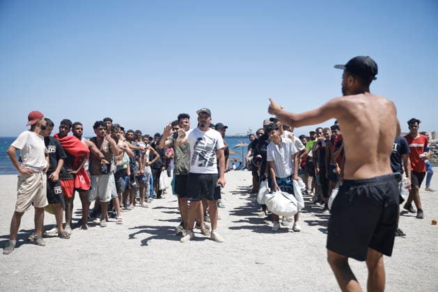 The barriers installed by the government in Ceuta are now fully operational. Several people on the beach, August 2, 2026, in Ceuta, Spain. The Tarajal border has remained calm despite a small group of people attempting to cross by swimming, but they were intercepted by the Army. Although more than 48,000 migrants who had entered irregularly last Thursday have already left Ceuta, an unknown number of people who have refused to return remain in the city. AUGUST 2, 2026 PIXELATED MIGRATION CRISIS Jesú Ceuta Ceuta, Spain  Copyright: xJesusxTorresx 7699311