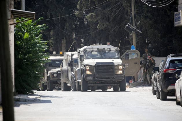 Israeli forces surround residential building during operation near Nablus Israeli military vehicles surround a residential building during a military operation in the city of Nablus and the village of Salem in the occupied West Bank on August 2, 2026. During the operation, Israeli forces raided the village of Salem, east of Nablus, and arrested a Palestinian man in his twenties. Photo by Mohammed Nasser apaimages Nablus West Bank Palestinian Territory 020826_Nablus_MN_00(8) Copyright: xapaimagesxMohammedxNasserx xapaimagesx