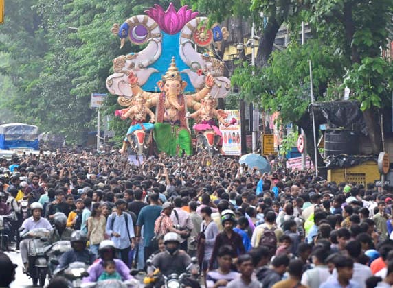 MUMBAI, INDIA - AUGUST 2: Devotees carry the Lord Ganesha idol ahead of Ganesh festival from Parel workshop, on August 2, 2026 in Mumbai, India. (Photo by Anshuman Poyrekar Hindustan Times ) Preparation Of Ganesh Chaturthi Festival