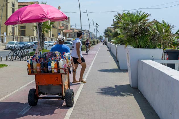 August 2, 2026, Rome, Italy: A grattacheccaro (a vendor of fresh granitas) heads towards the beaches of Lido di Ostia on the first day of the fourth heat wave hitting Italy and the coastal area of Ã¢â‚¬¹Ã¢â‚¬¹Rome.Italy is facing the peak of the fourth severe heat wave of the summer, fueled by the persistent African anticyclone and record temperatures in the Mediterranean Sea, which are amplifying water and climate emergencies in the Po Valley and central Italy. Rome Italy  - ZUMAv147 20260802_zip_v147_005 Copyright: xMarcelloxValerix