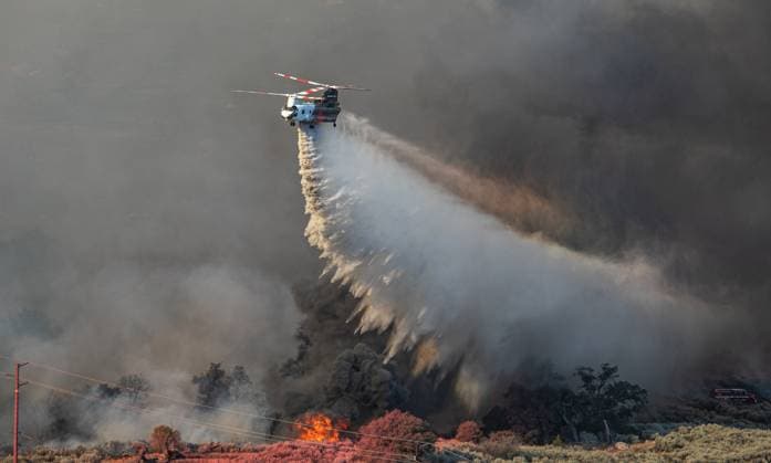 Aircraft Tackling California Wildfires Aircraft have been called to assist in fighting numerous fires throughout California. As fire behavior changes, so does the need for aircraft. Cal-Fire has added some C-130s to its fleet. Coulson Aviation has added CH-47 Chinooks that can carry up to 4,000 gallons of water or retardant. These aircraft have helped knockdown numerous fires and have prevented them from spreading. 31 Aug 2026 Pictured: Coulson Aviation CH-47 Chinook working the Grade fire.  Copyright: xThexMegaxAgencyxRyanxGrothex xMEGAx