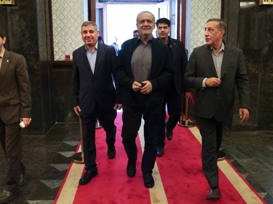 President Masoud Pezeshkian ( C ) attends a meeting with Iranian party officials in Tehran, Iran, on August 2, 2026. The Iranian president stressed the need to compel Donald Trump to honor signed commitments. At the same time, Foreign Minister Seyed Abbas Araghchi announced that negotiations with the Omani government have made significant progress and are nearing completion.  IRN2026080203 IranianxPresidency