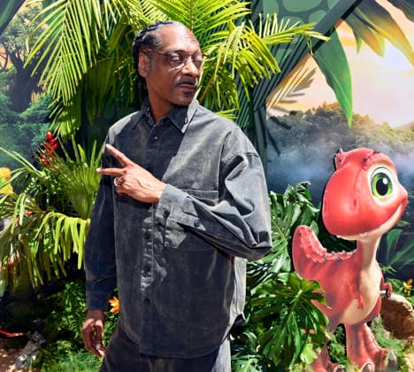 Cast member Snoop Dogg attends the global premiere of the computer animated animal adventure Paw Patrol: The Dino Movie at the Paramount Picture Studio lot in Los Angeles on Sunday, August 2, 2026. Storyline: The Paw Patrol lands on a mysterious dinosaur island after a storm, where they meet Rex, a stranded pup. When Humdinger s reckless mining triggers a volcano, the team faces their biggest rescue mission yet to save the island.  LAP2026080224 JIMxRUYMEN