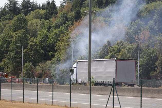 The scene of a brush fire along the E25 highway in Bastogne, on Monday 03 August 2026. A major brush fire broke out Monday morning in the municipality of Bastogne, near the Withimont highway rest area.  JULIENxWARNAND 182682043