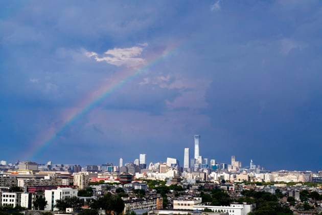 (260803) -- BEIJING, Aug. 3, 2026 -- A rainbow appears in the sky after rain in Beijing, capital of China, Aug. 3, 2026. ) CHINA-BEIJING-VIEW (CN) DuxJuanjuan 