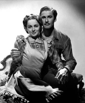 Dodge City, 1939 Olivia De Havilland & Errol Flynn Dodge City 01 April 1939 Herr des Wilden Westens Character(s): Abbie Irving, Wade Hatton Director: Michael Curtiz SSW89853 Allstar Picture Library Ltd WARNER BROS. **Warning** This Photograph is for editorial use only and is the copyright of WARNER BROS. and or the Photographer assigned by the Film or Production Company & can only be reproduced by publications in conjunction with the promotion of the above Film. A Mandatory Credit To WARNER BROS. is required. The Photographer should also be credited when known. No commercial use can be granted without written authority from the Film Company. Copyright: xWARNERxBROS.x