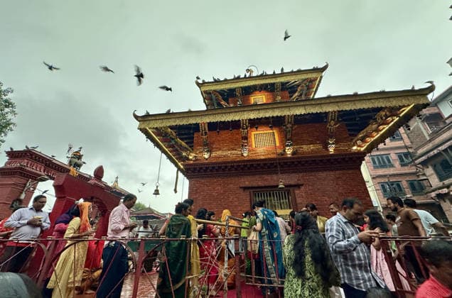 August 3, 2026, Kathmandu, Nepal: Devotees gather to offer prayers during Shrawan Somvar at a Shiva temple in Kathmandu, Nepal on August 3, 2026. Mondays (Somvars) in the sacred month of Shrawan are considered especially auspicious for the worship of Lord Shiva. Devotees observe fasts and offer prayers seeking blessings, health, and prosperity. Many women keep the Shrawan Somvar fast for the long life and well-being of their husbands, while unmarried women pray for a virtuous and compatible life partner. Kathmandu Nepal  - ZUMAs233 20260803_zap_s233_003 Copyright: xSunilxSharmax