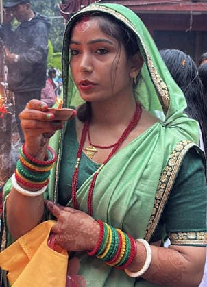 August 3, 2026, Kathmandu, Nepal: A woman offers prayers during Shrawan Somvar at a Shiva temple in Kathmandu, Nepal on August 3, 2026. Mondays (Somvars) in the sacred month of Shrawan are considered especially auspicious for the worship of Lord Shiva. Devotees observe fasts and offer prayers seeking blessings, health, and prosperity. Many women keep the Shrawan Somvar fast for the long life and well-being of their husbands, while unmarried women pray for a virtuous and compatible life partner. Kathmandu Nepal  - ZUMAs233 20260803_zap_s233_004 Copyright: xSunilxSharmax