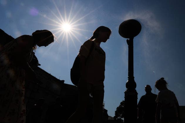 Krakow Misting Station People cool down at public misting station installed during the heatwave at Main Square in Krakow, Poland on August 3, 2026. Krakow Poland  Copyright: xJakubxPorzyckix originalFilename: porzycki-krakowmi260803_np4iw.jpg
