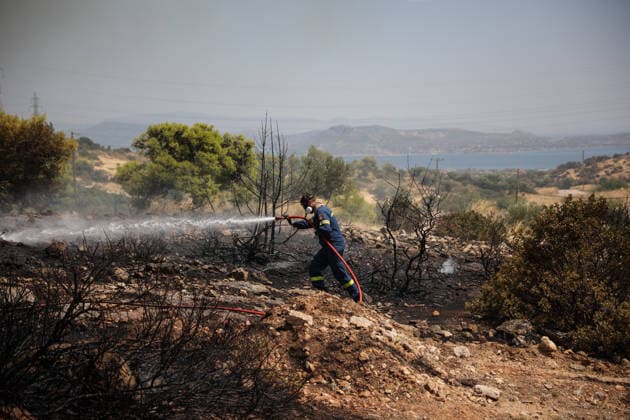 Wildfire in Greece s Megara region MEGARA, GREECE - AUGUST 3: Firefighters operate on the ground as a wildfire continues to burn for a third consecutive day in the Megara region, west of Athens, Greece on August 3, 2026. Emergency services are working to contain the blaze amid challenging weather conditions across the area. Aris Oikonomou Anadolu Megara Greece. Editorial use only. Please get in touch for any other usage.  Copyright: x2026xAnadoluxArisxOikonomoux