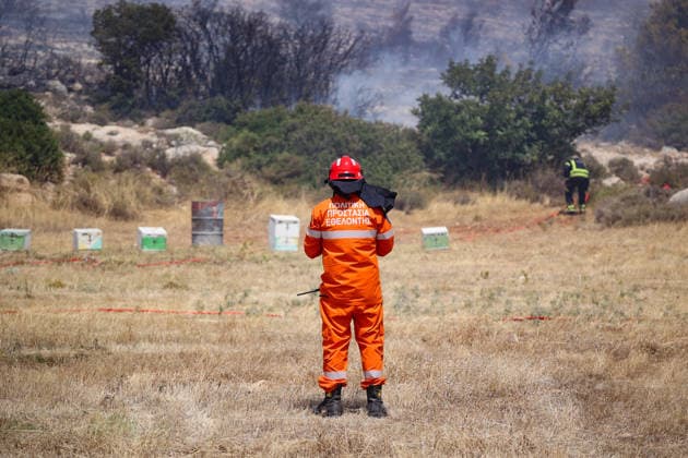 Wildfire in Greece s Megara region MEGARA, GREECE - AUGUST 3: Firefighters operate on the ground as a wildfire continues to burn for a third consecutive day in the Megara region, west of Athens, Greece on August 3, 2026. Emergency services are working to contain the blaze amid challenging weather conditions across the area. Aris Oikonomou Anadolu Megara Greece. Editorial use only. Please get in touch for any other usage.  Copyright: x2026xAnadoluxArisxOikonomoux