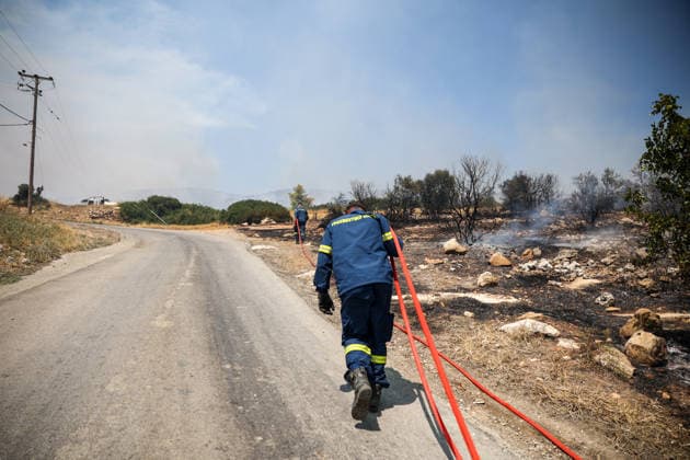 Wildfire in Greece s Megara region MEGARA, GREECE - AUGUST 3: Firefighters operate on the ground as a wildfire continues to burn for a third consecutive day in the Megara region, west of Athens, Greece on August 3, 2026. Emergency services are working to contain the blaze amid challenging weather conditions across the area. Aris Oikonomou Anadolu Megara Greece. Editorial use only. Please get in touch for any other usage.  Copyright: x2026xAnadoluxArisxOikonomoux