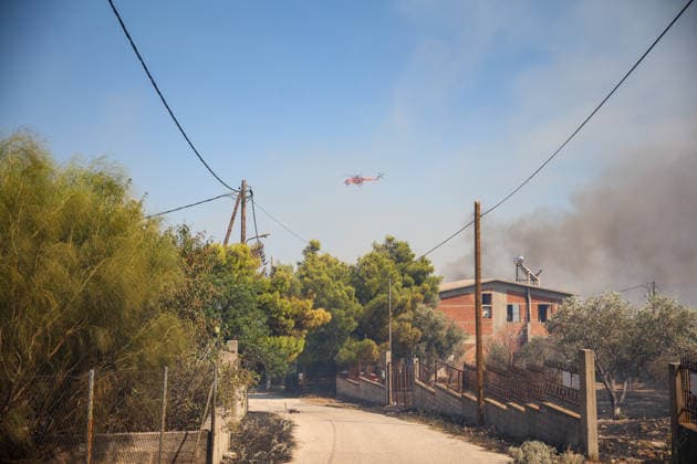 Wildfire in Greece s Megara region MEGARA, GREECE - AUGUST 3: Firefighters operate on the air as a wildfire continues to burn for a third consecutive day in the Megara region, west of Athens, Greece on August 3, 2026. Emergency services are working to contain the blaze amid challenging weather conditions across the area. Aris Oikonomou Anadolu Megara Greece. Editorial use only. Please get in touch for any other usage.  Copyright: x2026xAnadoluxArisxOikonomoux