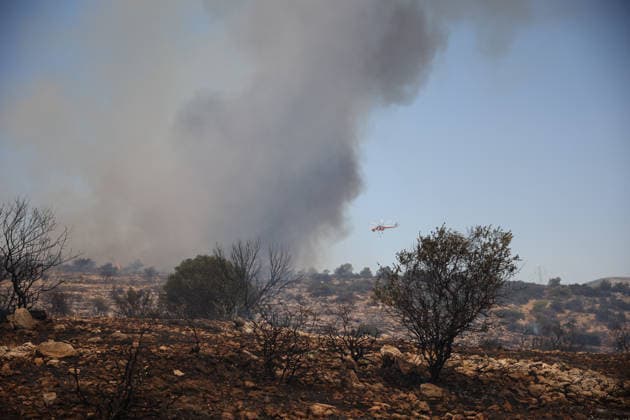 Wildfire in Greece s Megara region MEGARA, GREECE - AUGUST 3: Firefighters operate on the air as a wildfire continues to burn for a third consecutive day in the Megara region, west of Athens, Greece on August 3, 2026. Emergency services are working to contain the blaze amid challenging weather conditions across the area. Aris Oikonomou Anadolu Megara Greece. Editorial use only. Please get in touch for any other usage.  Copyright: x2026xAnadoluxArisxOikonomoux