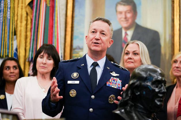 Chair of the Joint Chiefs Gen. Dan Caine speaks during the announcement of an executive order establishing the Presidential Military Spouse Commission in the Oval Office at the White House in Washington, DC on Monday, August 3, 2026. The advisory board, led by Jennifer Hegseth, wife of Secretary of Defense Pete Hegseth, will focus on key quality-of-life areas for military families including employment, childcare, housing, healthcare, and education.  WASP20260803105 AllisonxRobbert