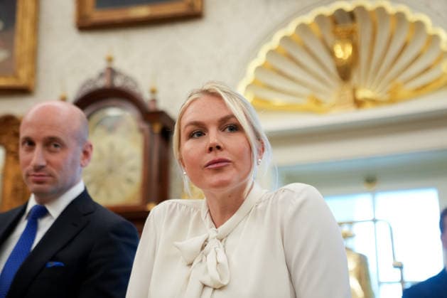 White House Press Secretary Karoline Leavitt and Deputy Chief of Staff Stephen Miller look on as President Donald Trump announces an executive order establishing the Presidential Military Spouse Commission in the Oval Office at the White House in Washington, DC on Monday, August 3, 2026. The advisory board, led by Jennifer Hegseth, wife of Secretary of Defense Pete Hegseth, will focus on key quality-of-life areas for military families including employment, childcare, housing, healthcare, and education.  WASP20260803119 AllisonxRobbert