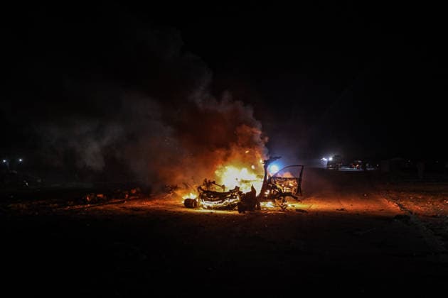 Two Palestinians killed in an Israeli attack on a vehicle in Gaza GAZA CITY, GAZA, PALESTINE - AUGUST 3: A view of a destroyed vehicle following an Israeli airstrike on Rashid Street in Gaza City, Gaza, Palestine on August 3, 2026. At least two Palestinians were killed and several others injured in the attack. Hamza Z. H. Qraiqea Anadolu Gaza City Gaza. Editorial use only. Please get in touch for any other usage.  Copyright: x2026xAnadoluxHamzaxZ.xH.xQraiqeax