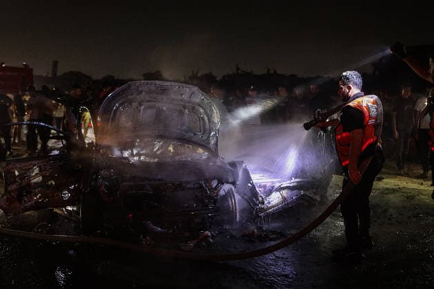 Two Palestinians killed in an Israeli attack on a vehicle in Gaza GAZA CITY, GAZA, PALESTINE - AUGUST 3: A view of a destroyed vehicle following an Israeli airstrike on Rashid Street in Gaza City, Gaza, Palestine on August 3, 2026. At least two Palestinians were killed and several others injured in the attack. Hamza Z. H. Qraiqea Anadolu Gaza City Gaza. Editorial use only. Please get in touch for any other usage.  Copyright: x2026xAnadoluxHamzaxZ.xH.xQraiqeax
