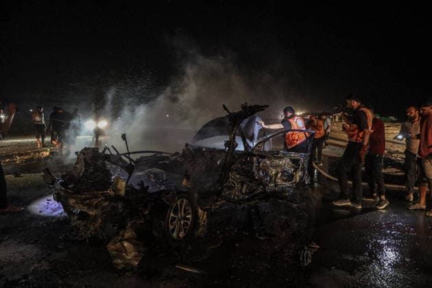 Two Palestinians killed in an Israeli attack on a vehicle in Gaza GAZA CITY, GAZA, PALESTINE - AUGUST 3: A view of a destroyed vehicle following an Israeli airstrike on Rashid Street in Gaza City, Gaza, Palestine on August 3, 2026. At least two Palestinians were killed and several others injured in the attack. Hamza Z. H. Qraiqea Anadolu Gaza City Gaza. Editorial use only. Please get in touch for any other usage.  Copyright: x2026xAnadoluxHamzaxZ.xH.xQraiqeax