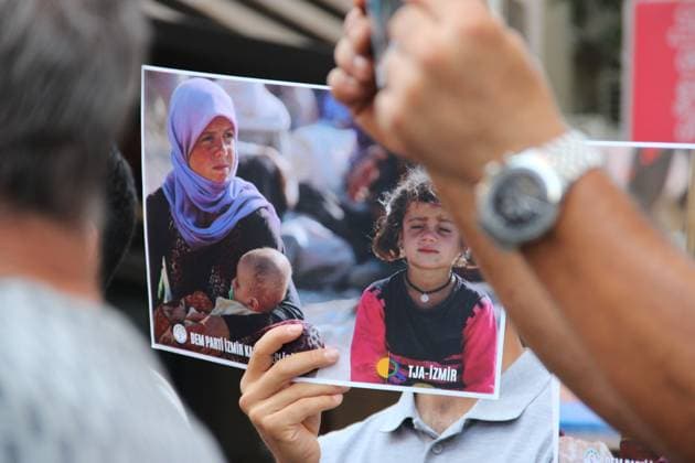 Yazidi Genocide Anniversary Commemorated in Ä°zmir Ä°ZMÄ°R, Türkiye August 3, 2026: Members of the DEM Party Women™s Assembly and the Free Women™s Movement (Tevgera JinÃªn Azad) hold a press statement in Alsancak to mark the 12th anniversary of the ISIS attack on the Yazidi community in Sinjar, Iraq. Participants display photographs of Yazidi women who were killed, abducted, or subjected to sexual slavery during the 2014 attacks, commemorating victims of atrocities recognized by the United Nations and the European Parliament as genocide. Izmir Türkiye Copyright: x xNagihanxCakirx xJNAxPressx