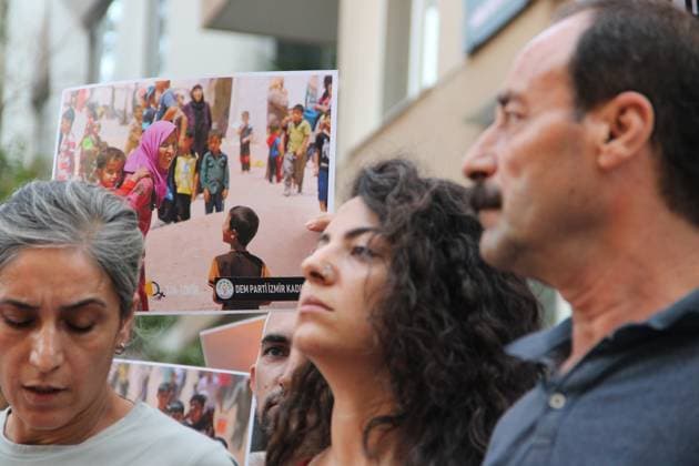 Yazidi Genocide Anniversary Commemorated in Ä°zmir Ä°ZMÄ°R, Türkiye August 3, 2026: Members of the DEM Party Women™s Assembly and the Free Women™s Movement (Tevgera JinÃªn Azad) hold a press statement in Alsancak to mark the 12th anniversary of the ISIS attack on the Yazidi community in Sinjar, Iraq. Participants display photographs of Yazidi women who were killed, abducted, or subjected to sexual slavery during the 2014 attacks, commemorating victims of atrocities recognized by the United Nations and the European Parliament as genocide. Izmir Türkiye Copyright: x xNagihanxCakirx xJNAxPressx