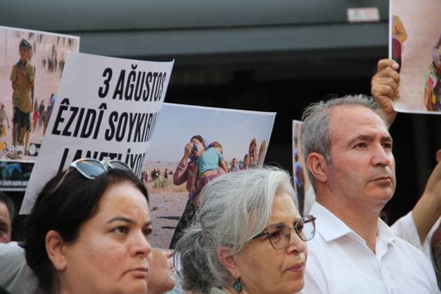 Yazidi Genocide Anniversary Commemorated in Ä°zmir Ä°ZMÄ°R, Türkiye August 3, 2026: Members of the DEM Party Women™s Assembly and the Free Women™s Movement (Tevgera JinÃªn Azad) hold a press statement in Alsancak to mark the 12th anniversary of the ISIS attack on the Yazidi community in Sinjar, Iraq. Participants display photographs of Yazidi women who were killed, abducted, or subjected to sexual slavery during the 2014 attacks, commemorating victims of atrocities recognized by the United Nations and the European Parliament as genocide. Izmir Türkiye Copyright: x xNagihanxCakirx xJNAxPressx