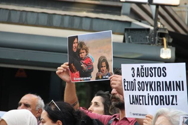 Yazidi Genocide Anniversary Commemorated in Ä°zmir Ä°ZMÄ°R, Türkiye August 3, 2026: Members of the DEM Party Women™s Assembly and the Free Women™s Movement (Tevgera JinÃªn Azad) hold a press statement in Alsancak to mark the 12th anniversary of the ISIS attack on the Yazidi community in Sinjar, Iraq. Participants display photographs of Yazidi women who were killed, abducted, or subjected to sexual slavery during the 2014 attacks, commemorating victims of atrocities recognized by the United Nations and the European Parliament as genocide. Izmir Türkiye Copyright: x xNagihanxCakirx xJNAxPressx
