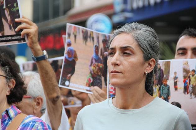 Yazidi Genocide Anniversary Commemorated in Ä°zmir Ä°ZMÄ°R, Türkiye August 3, 2026: Members of the DEM Party Women™s Assembly and the Free Women™s Movement (Tevgera JinÃªn Azad) hold a press statement in Alsancak to mark the 12th anniversary of the ISIS attack on the Yazidi community in Sinjar, Iraq. Participants display photographs of Yazidi women who were killed, abducted, or subjected to sexual slavery during the 2014 attacks, commemorating victims of atrocities recognized by the United Nations and the European Parliament as genocide. Izmir Türkiye Copyright: x xNagihanxCakirx xJNAxPressx